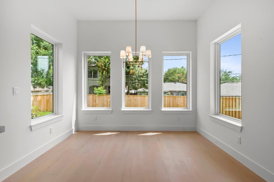 Breakfast nook with lots of natural lighting. Breakfast nook with lots of natural lighting.