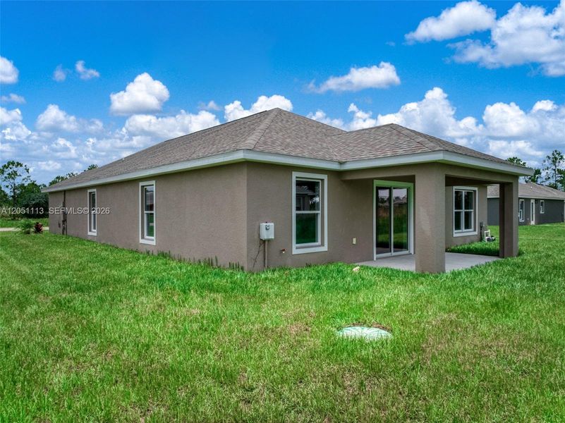 Exterior details and patio area of a home in , Sebring (Image 4). Exterior details and patio area of a home in , Sebring (Image 4).