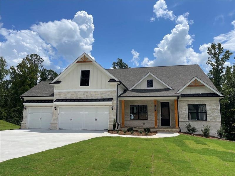 Front exterior of a new home in , Cumming, GA, highlighting curb appeal (Image 2). Front exterior of a new home in , Cumming, GA, highlighting curb appeal (Image 2).