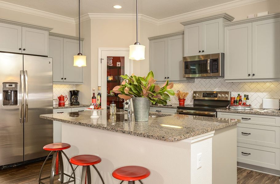 Representative furnished interior of a home built from the Fresh Spring by Neal Communities in SkySail, Naples (Image 6).