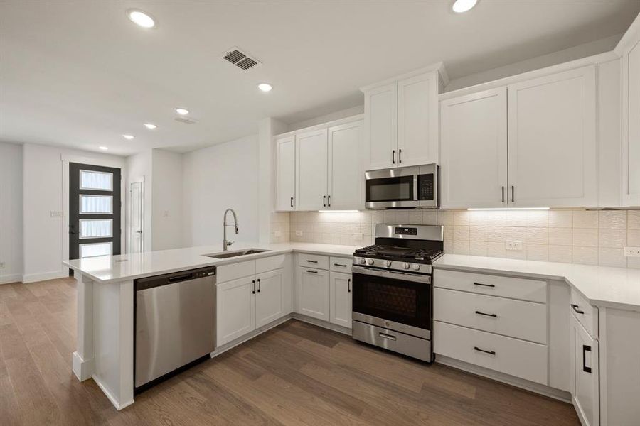 You'll enjoy outstanding prep and storage space in this dream kitchen! You'll enjoy outstanding prep and storage space in this dream kitchen!