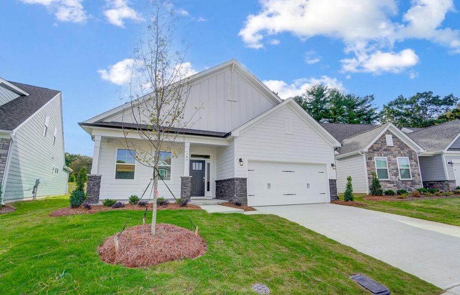 Representative exterior photo of a completed home built from the Grayson by Eastwood Homes in Secrest Meadows, Monroe, NC (Image 2).