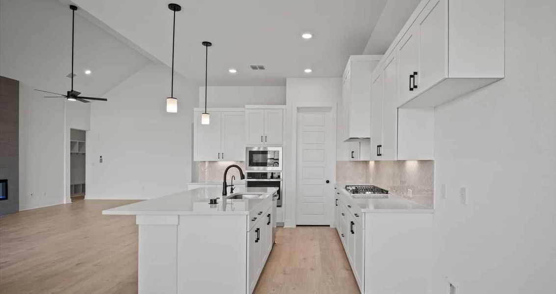 Representative furnished interior of a home built from the Farris by Chesmar Homes in 6 Creeks, Kyle (Image 4).