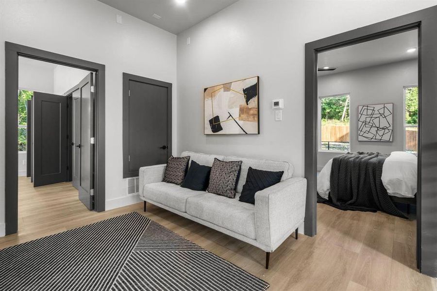 Living area featuring light wood-style flooring