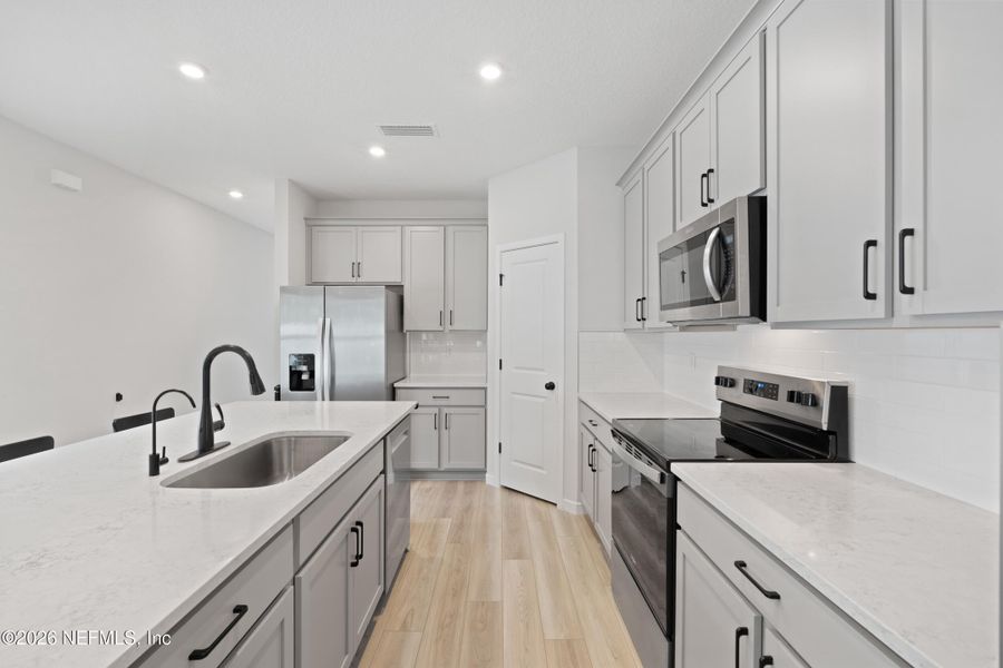 Furnished interior view inside a new home in Concourse Crossing, Fernandina Beach (Image 12).