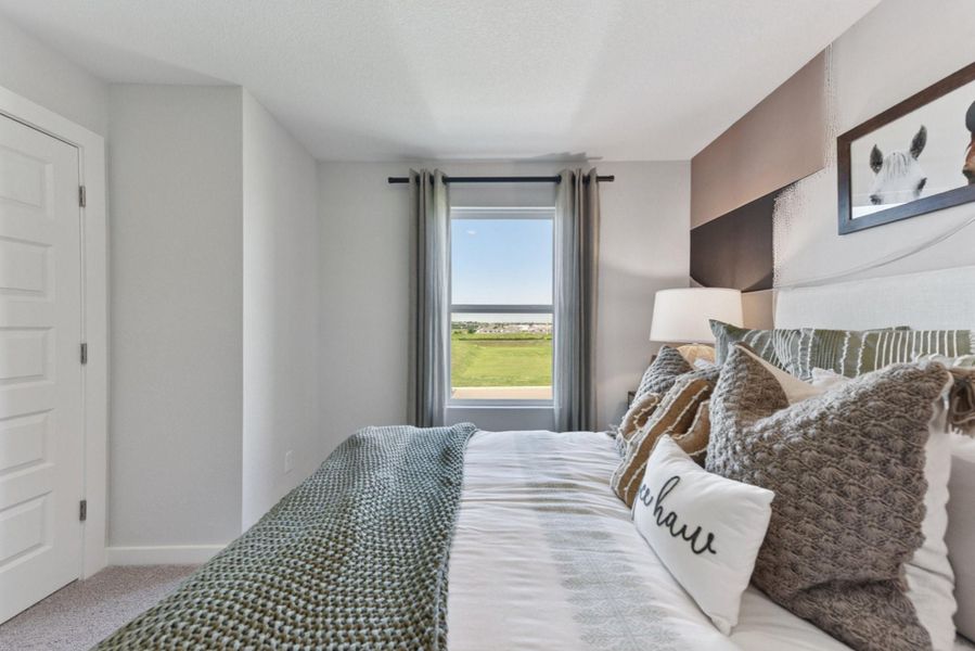 Furnished interior view inside a new home in The Overlook at Trinity Ranch, Elgin (Image 21). Furnished interior view inside a new home in The Overlook at Trinity Ranch, Elgin (Image 21).