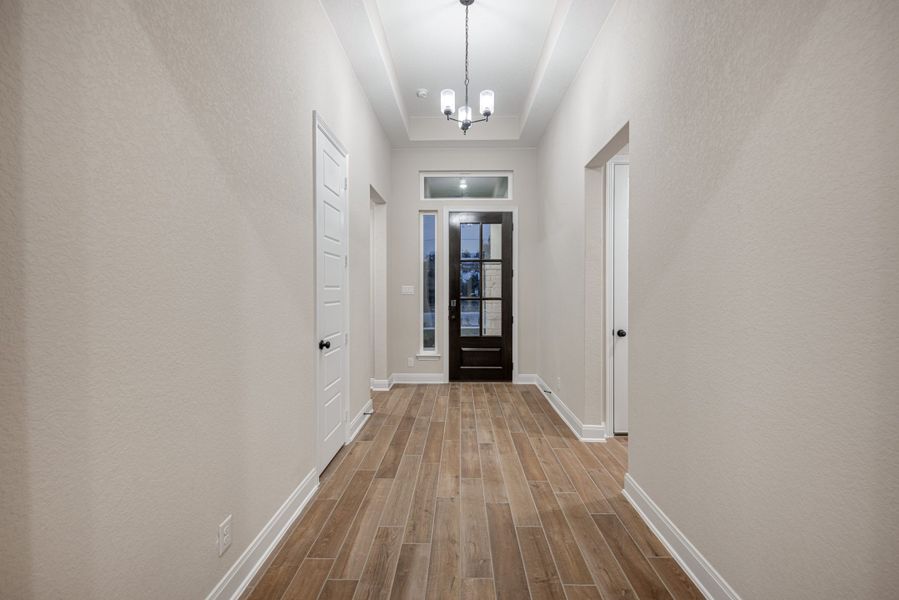 Representative unfurnished interior of a home built from the Mackenzie by Chesmar Homes in Sienna Lakes, San Antonio (Image 11).