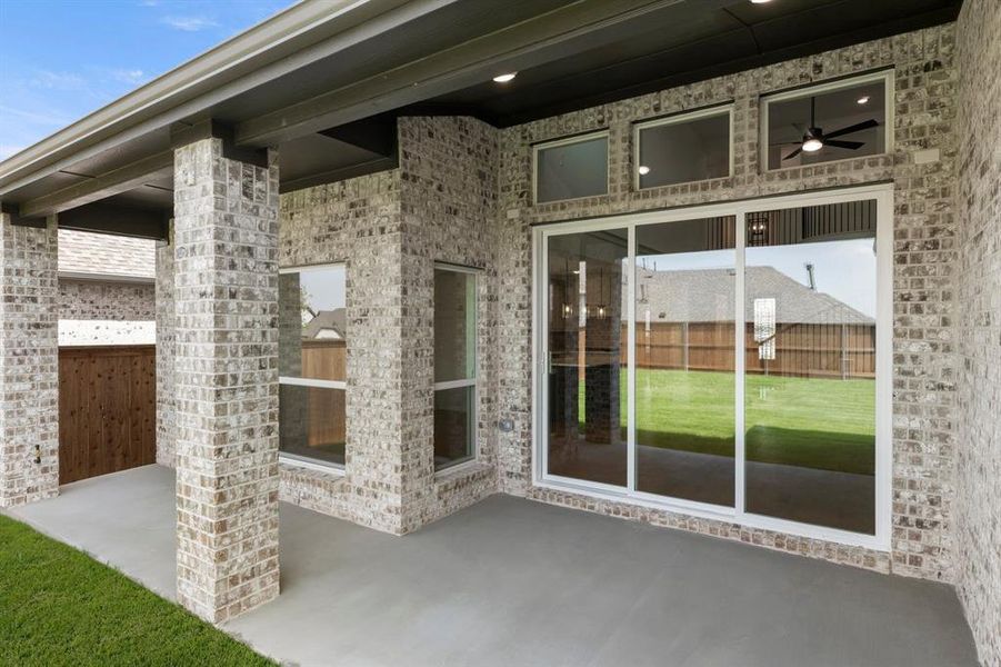 Exterior details and patio area of a home in Inspiration, Lucas (Image 26).