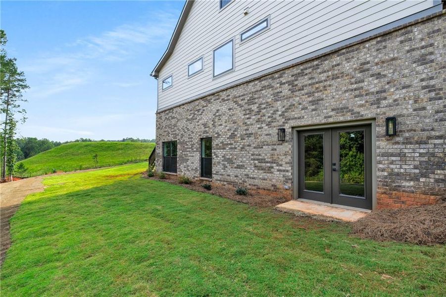 Front exterior of a new home in , Jefferson, GA, highlighting curb appeal (Image 21).