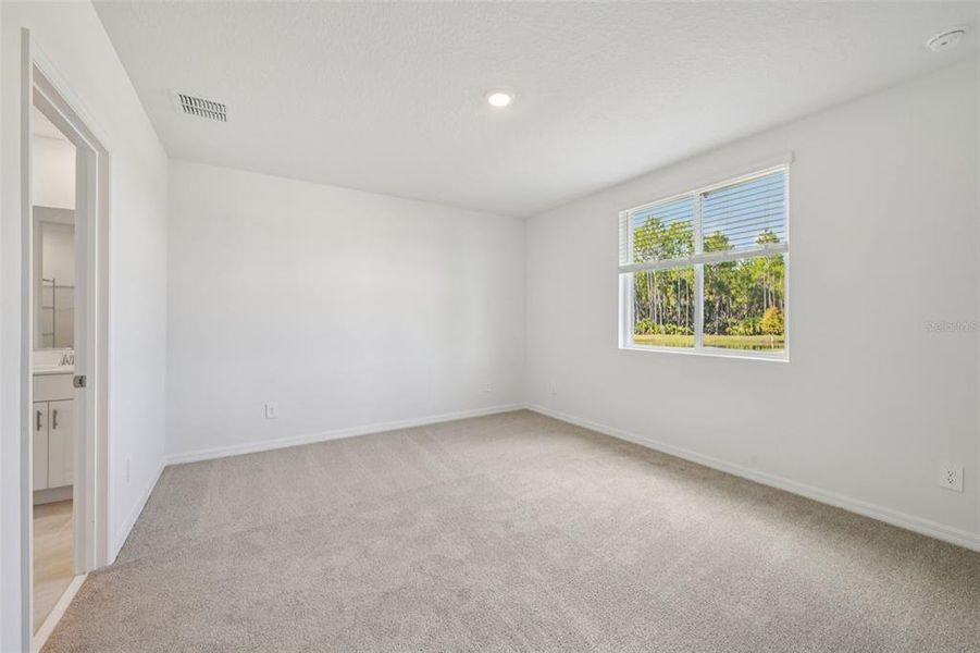 Spacious, unfurnished interior of a new home in Ridgehaven - Villas, Ormond Beach (Image 25).