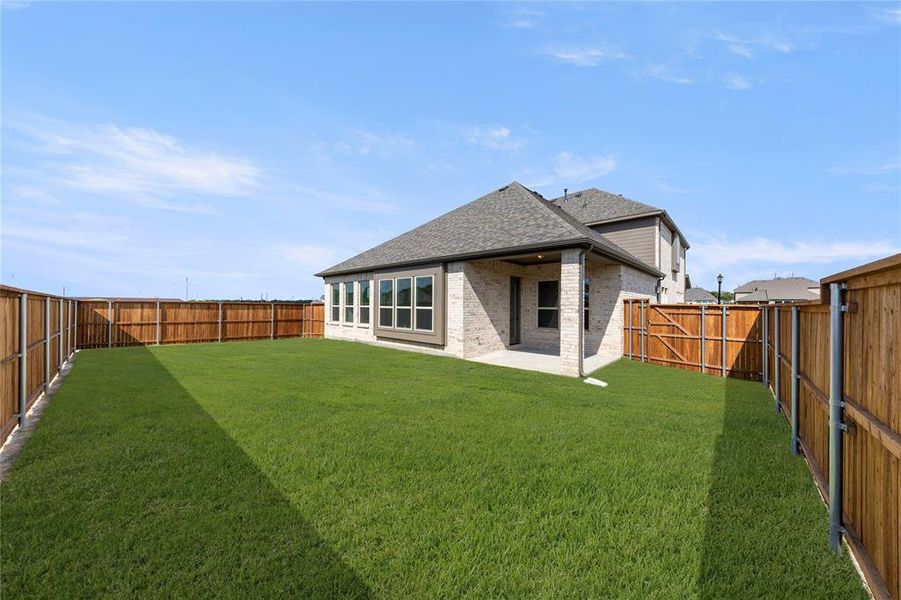 Exterior details and patio area of a home in River Ranch, Van Alstyne (Image 4). Exterior details and patio area of a home in River Ranch, Van Alstyne (Image 4).