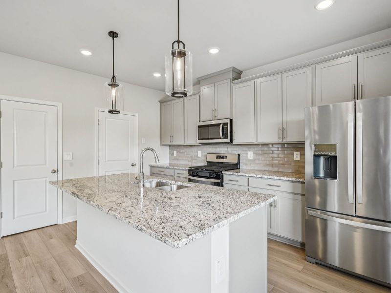 Furnished interior view inside a new home in Avalon - Reserve Series, Conyers (Image 4).