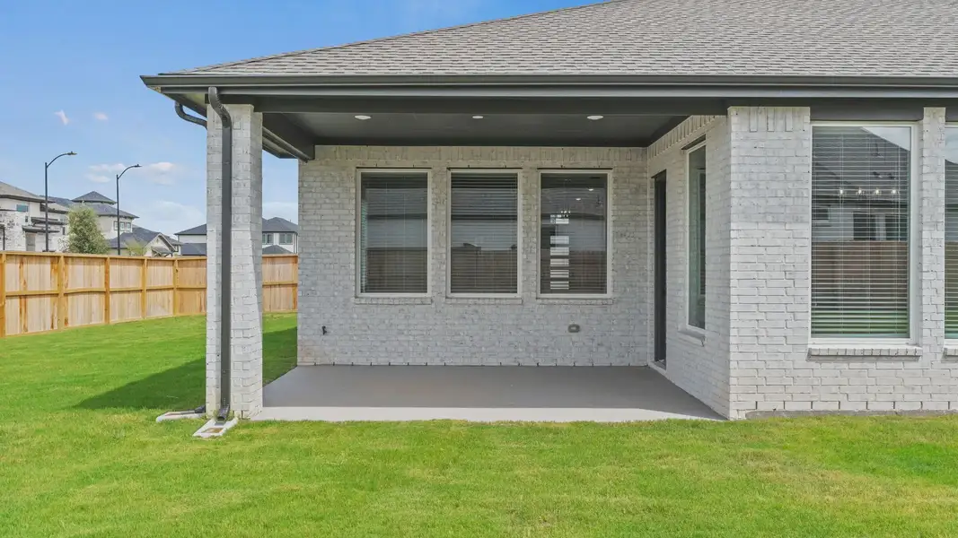 Exterior details and patio area of a home in Elyson 60's, Katy (Image 3). Exterior details and patio area of a home in Elyson 60's, Katy (Image 3).