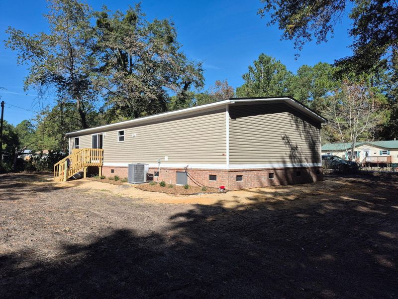 Exterior details and patio area of a home in , Walterboro (Image 12).