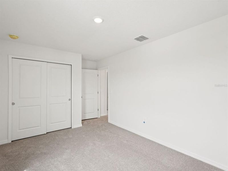 Spacious, unfurnished interior of a new home in Magnolia Bay - Classic Series, Nokomis (Image 21).