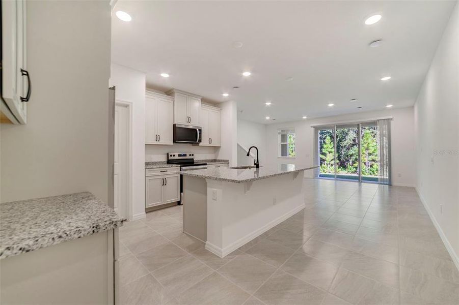Furnished interior view inside a new home in Towns at Greenleaf, Oviedo (Image 4).