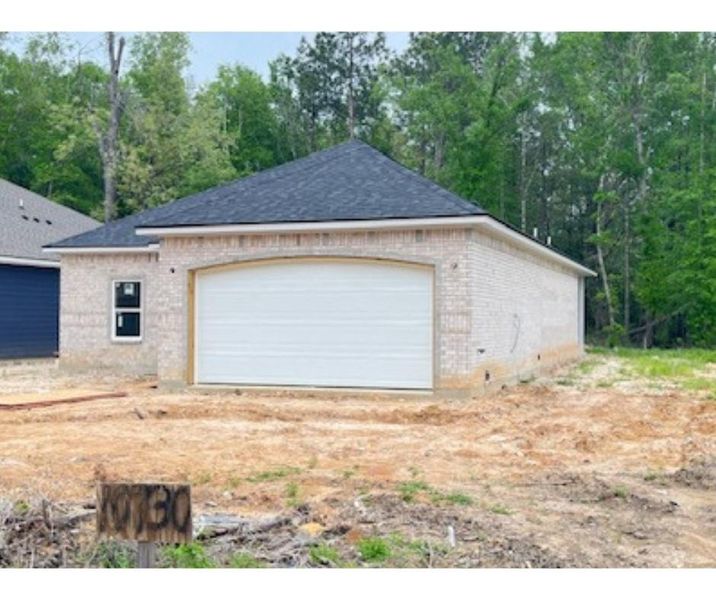 Front exterior of a new home in , Beaumont, TX, highlighting curb appeal (Image 1). Front exterior of a new home in , Beaumont, TX, highlighting curb appeal (Image 1).