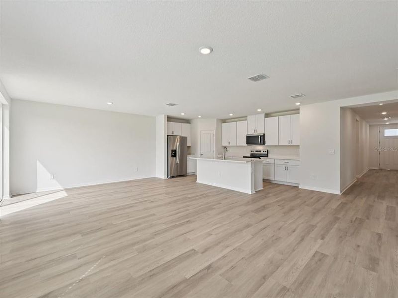 Spacious, unfurnished interior of a new home in The Reserve at Van Oaks, Auburndale (Image 24).