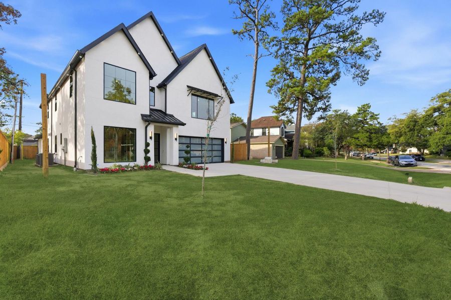 Front exterior of a new home in , Houston, TX, highlighting curb appeal (Image 26).