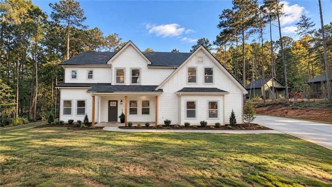 Front exterior of a new home in , Winston, GA, highlighting curb appeal (Image 2). Front exterior of a new home in , Winston, GA, highlighting curb appeal (Image 2).