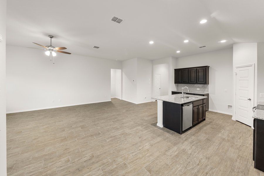 Representative exterior photo of a completed home built from the Cheyenne by Impression Homes in DeBerry Reserve, Royse City, TX (Image 9).