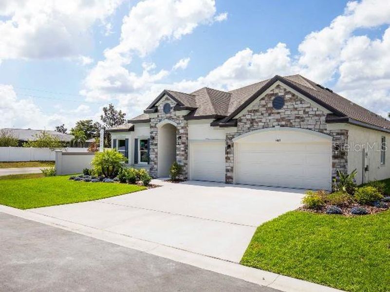 Front exterior of a new home in Pine Ridge, Beverly Hills, FL, highlighting curb appeal (Image 2). Front exterior of a new home in Pine Ridge, Beverly Hills, FL, highlighting curb appeal (Image 2).