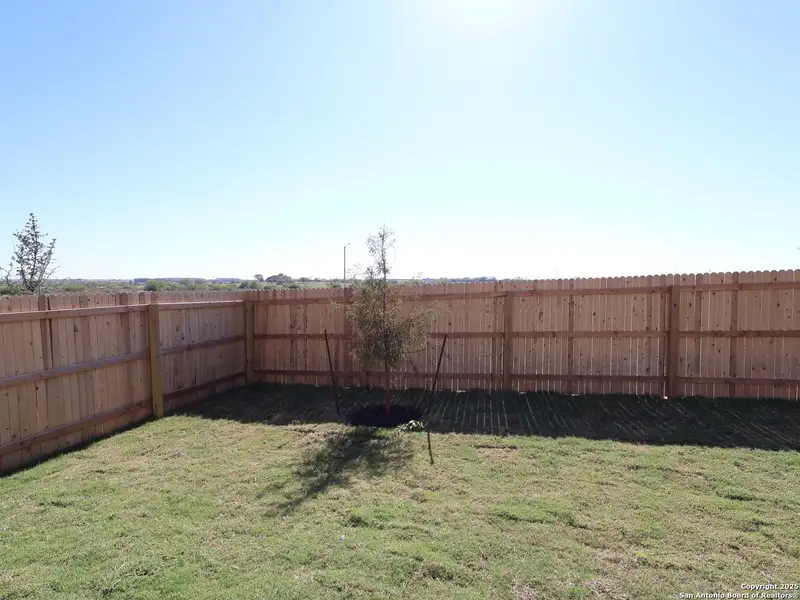 Exterior details and patio area of a home in Paloma Park, Converse (Image 4).