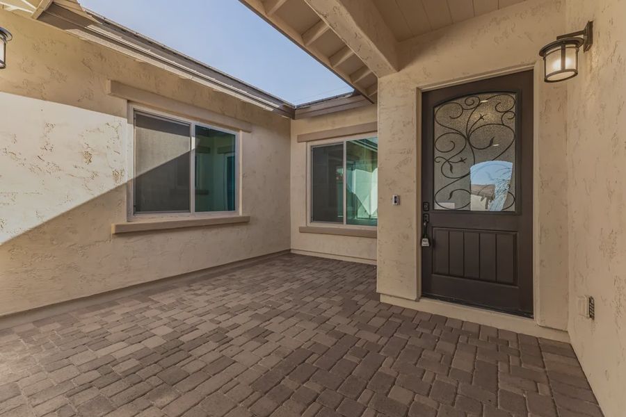 Exterior details and patio area of a home in Bellero Estates, Queen Creek (Image 2). Exterior details and patio area of a home in Bellero Estates, Queen Creek (Image 2).