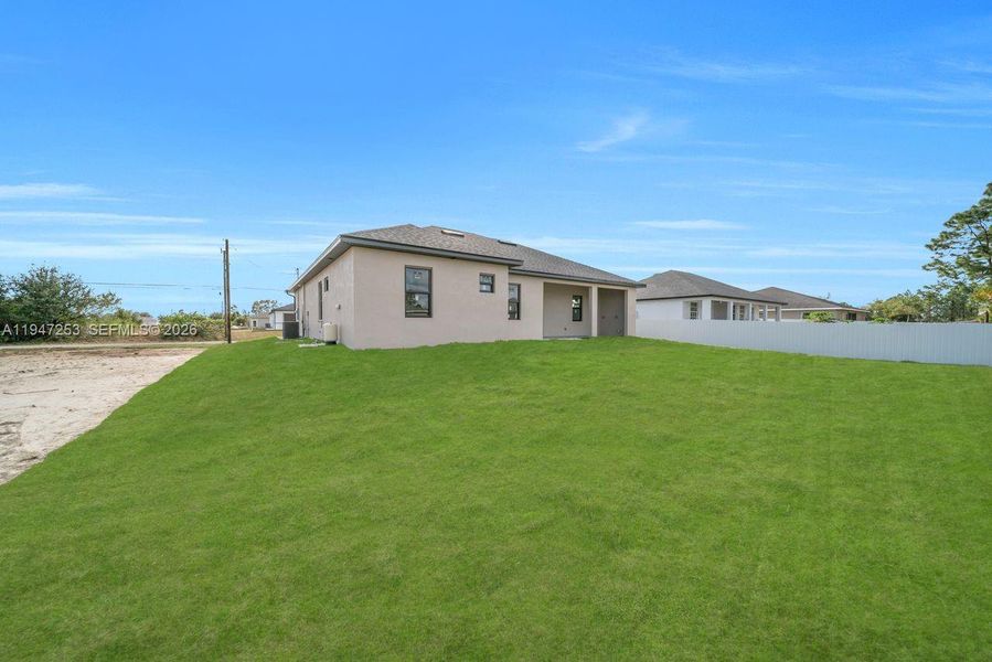 Exterior details and patio area of a home in , Lehigh Acres (Image 23).
