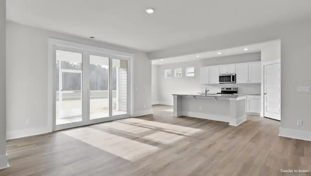 Spacious, unfurnished interior of a new home in The Highlands at Cedar Hill Landing, Navassa (Image 24).