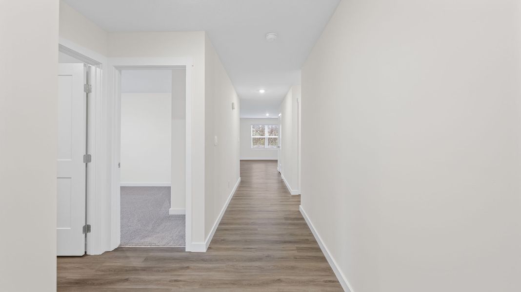 Representative unfurnished interior of a home built from the Freeport by D.R. Horton in Owensby Farms, Dayton (Image 11).