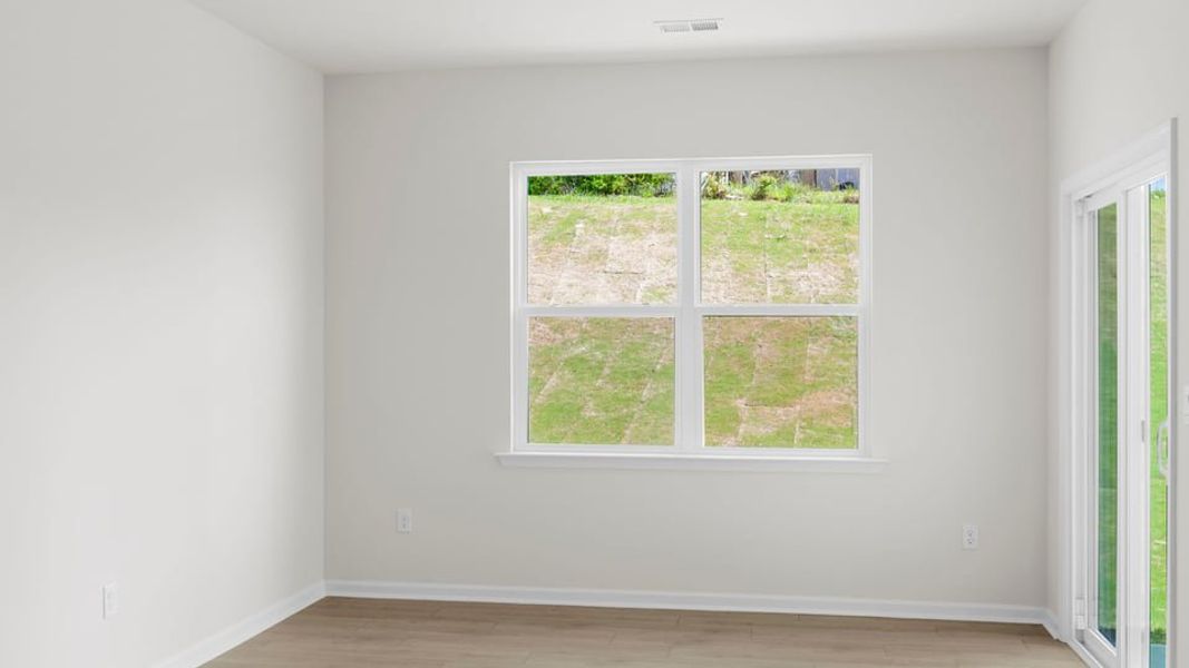 Spacious, unfurnished interior of a new home in Durbin Meadows Traditions, Fountain Inn (Image 23).