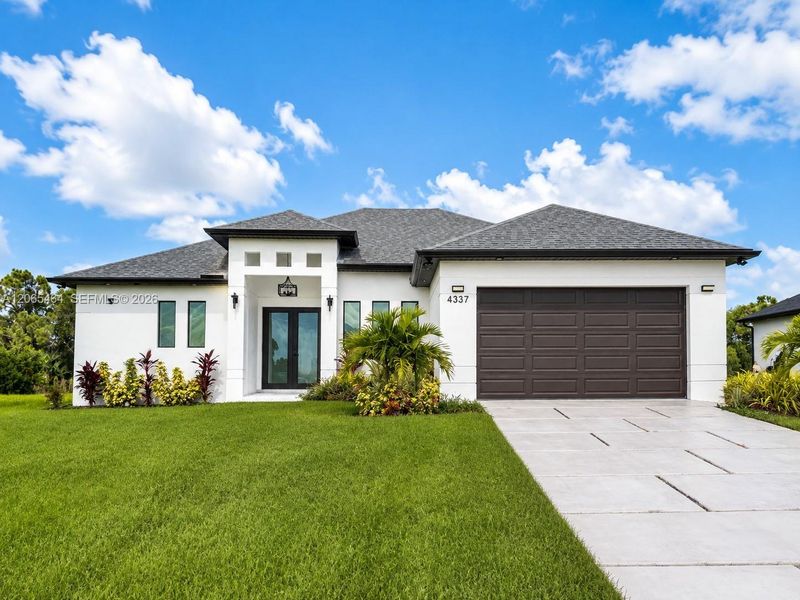 Front exterior of a new home in , Cape Coral, FL, highlighting curb appeal (Image 1). Front exterior of a new home in , Cape Coral, FL, highlighting curb appeal (Image 1).