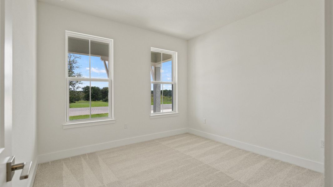 Buttonwood floor plan flex space in the interior entry by DRB Homes at Lakeside at Satilla in Saint Cloud, FL