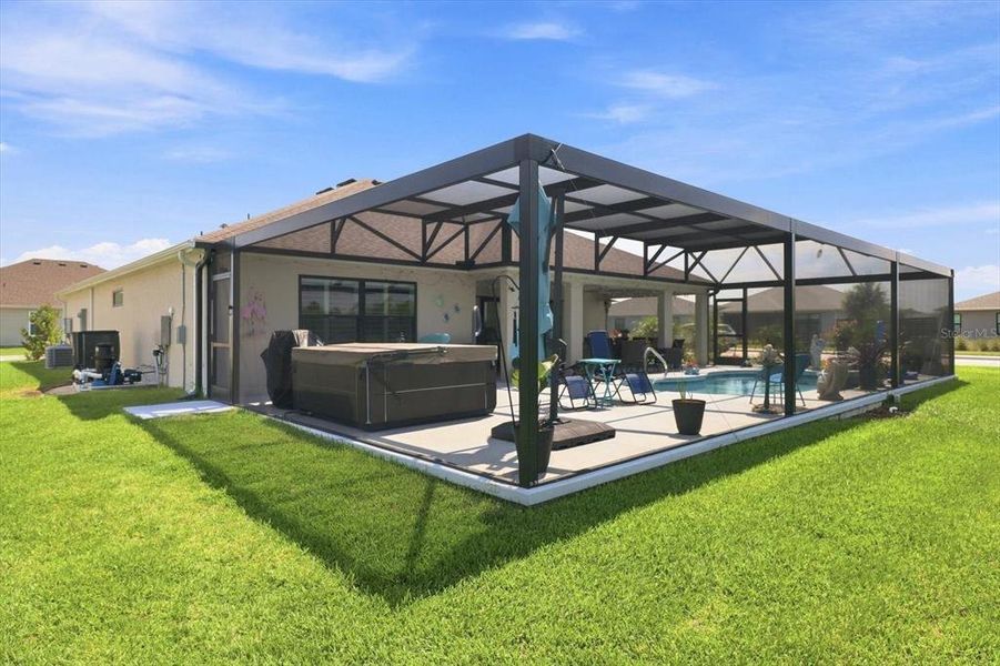 Exterior details and patio area of a home in , The Villages (Image 24).