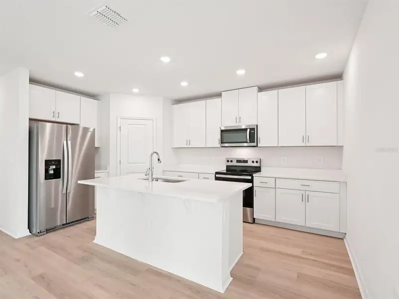 Furnished interior view inside a new home in Magnolia Bay - Classic Series, Nokomis (Image 5).