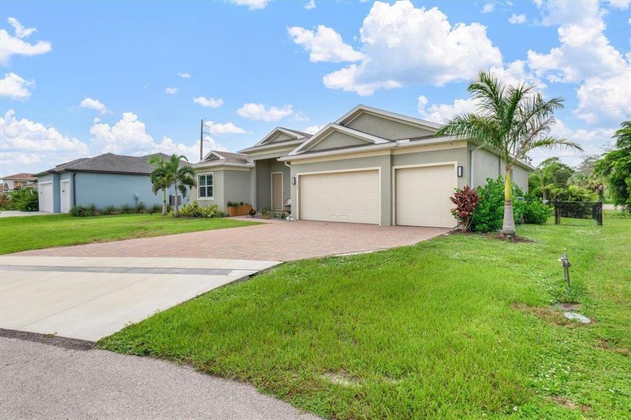 Front exterior of a new home in , Punta Gorda, FL, highlighting curb appeal (Image 19).
