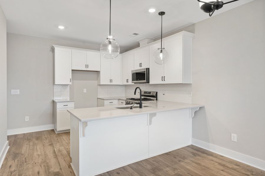 Representative furnished interior of a home built from the Holland by Hunter Quinn Homes in Victor Park, Greer (Image 12).