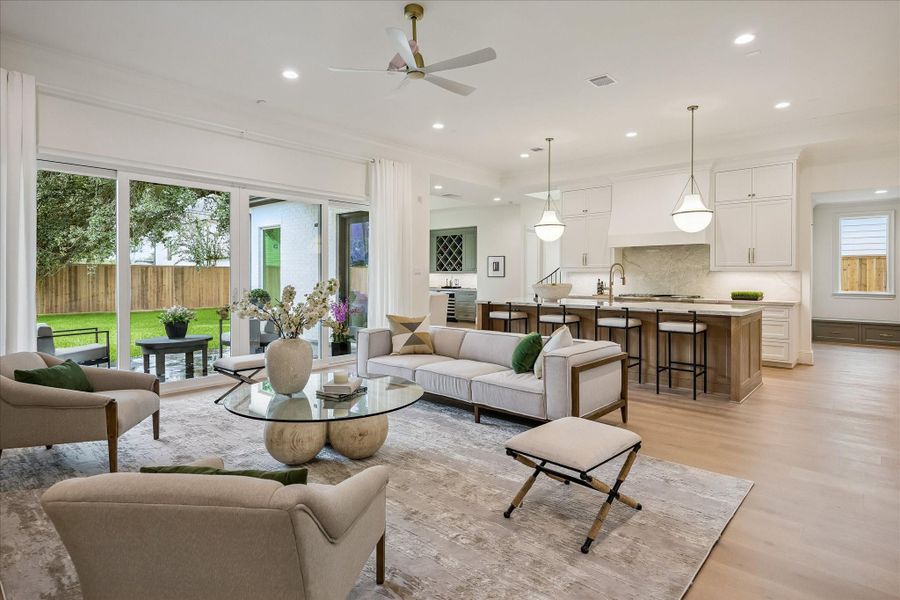 Open concept family / kitchen / dining area opens to outdoor living