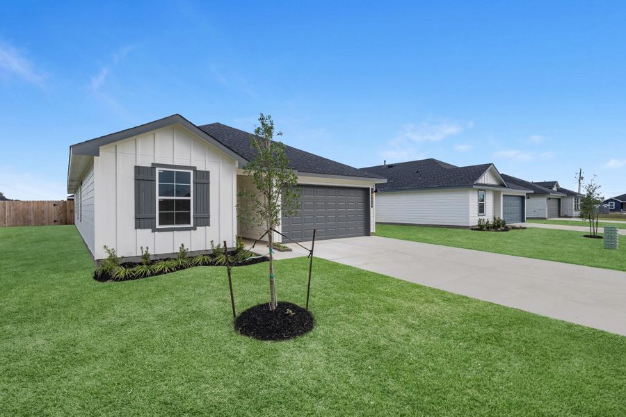 Front exterior of a new home in Reserve at Mallard Lakes, Orange, TX, highlighting curb appeal (Image 1). Front exterior of a new home in Reserve at Mallard Lakes, Orange, TX, highlighting curb appeal (Image 1).