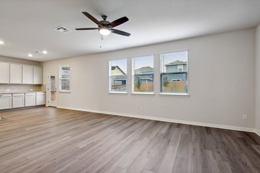 Living room in the Red River floorplan at a Meritage Homes community.