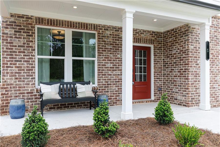 Front exterior of a new home in Rhodes Glen, Lawrenceville, GA, highlighting curb appeal (Image 27).