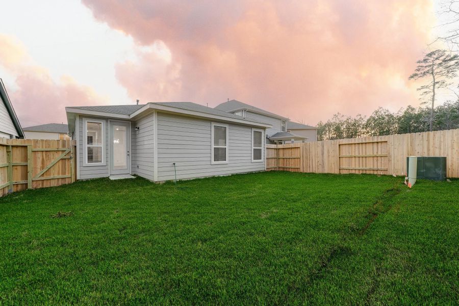 Exterior details and patio area of a home in Creekside Court, Magnolia (Image 4). Exterior details and patio area of a home in Creekside Court, Magnolia (Image 4).
