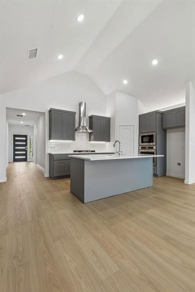 Kitchen in the Claret home plan by Trophy Signature Homes – REPRESENTATIVE PHOTO