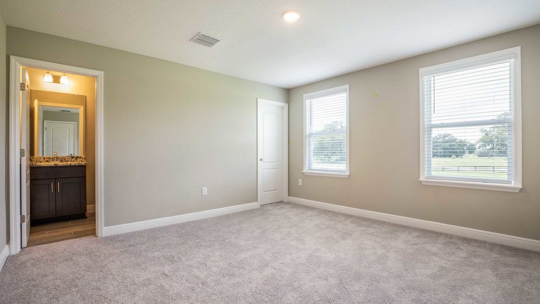 Representative unfurnished interior of a home built from the Columbus by Maronda Homes in Bella Estates, Plant City (Image 19).
