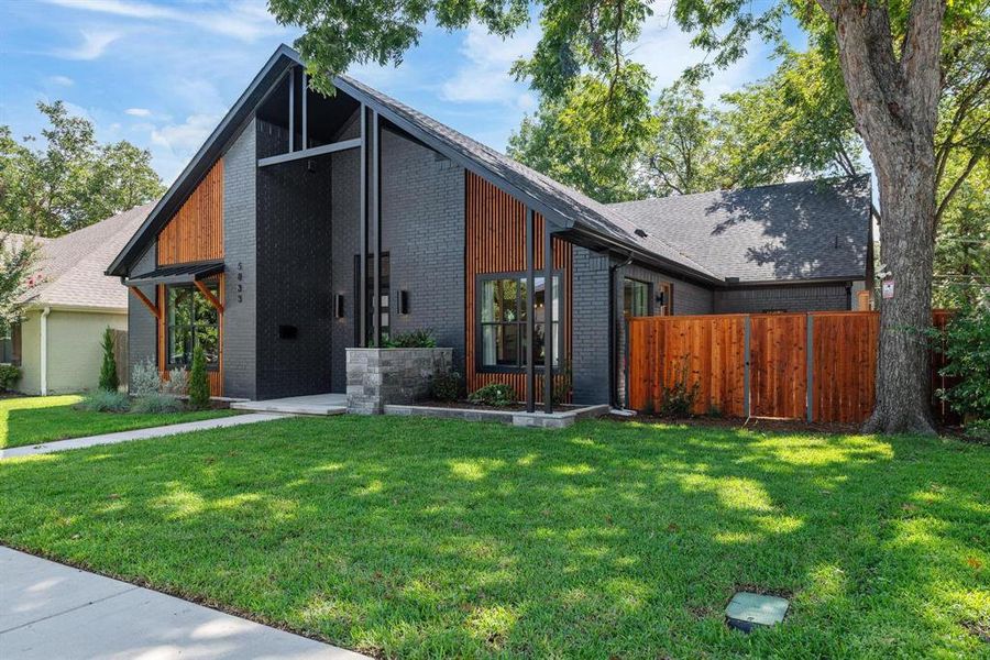 Modern home with brick siding Modern home with brick siding