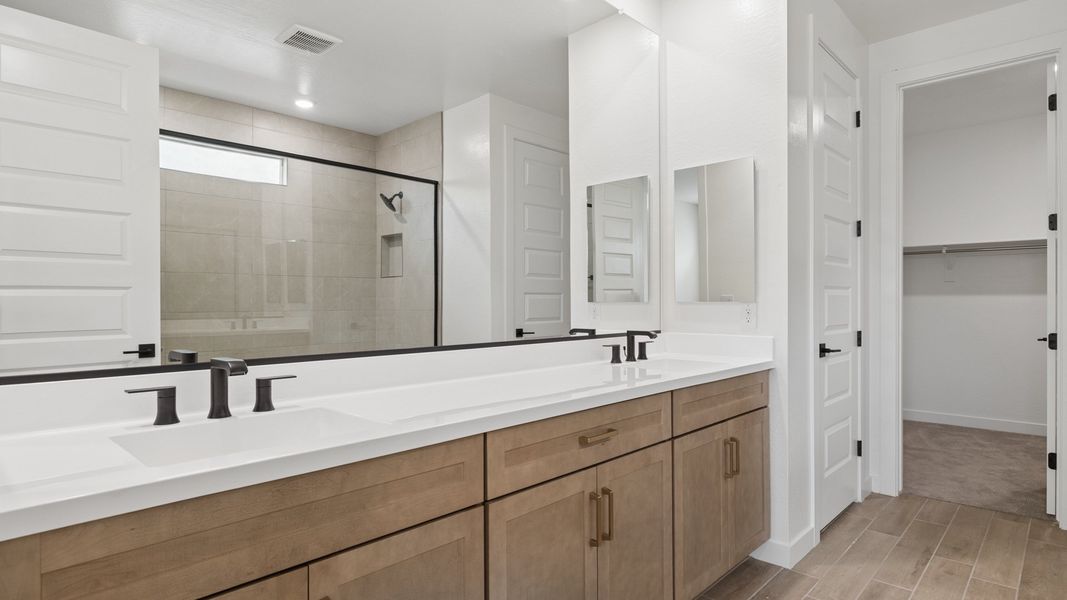 Representative furnished interior of a home built from the Phoenician by D.R. Horton in The Ridge at Stone Butte, Phoenix (Image 12).
