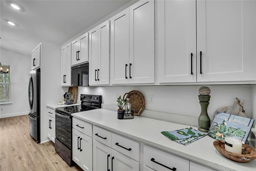 Furnished interior view inside a new home in , Weeki Wachee (Image 43).