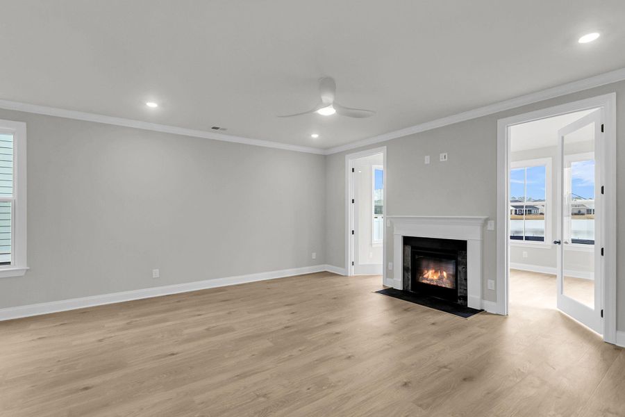 Spacious, unfurnished interior of a new home in Tidewater at Lakes of Cane Bay, Summerville (Image 30).