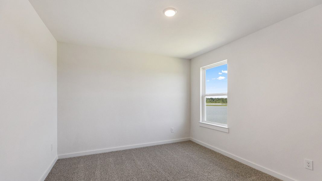 Furnished interior view inside a new home in Mostyn Springs, Magnolia (Image 25).